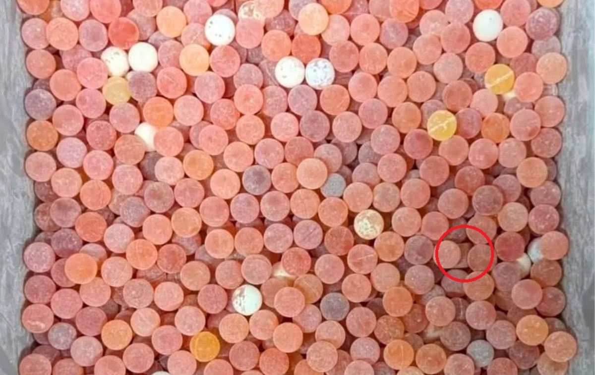 A tray full of round orange candies, Photo Credit: Minion Quotes/Facebook