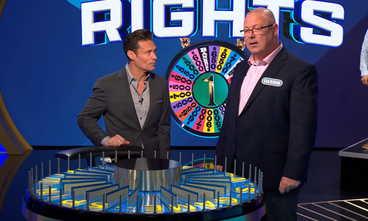 Show host Ryan Seacrest and contestant Darrin Gallagher in a 'Wheel of Fortune' episode, Photo Credit:Wheel Of Fortune/Youtube
