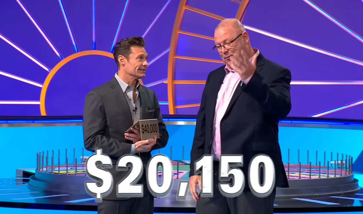 Show host Ryan Seacrest and contestant Darrin Gallagher in a 'Wheel of Fortune' episode, Photo Credit:Wheel Of Fortune/Youtube
