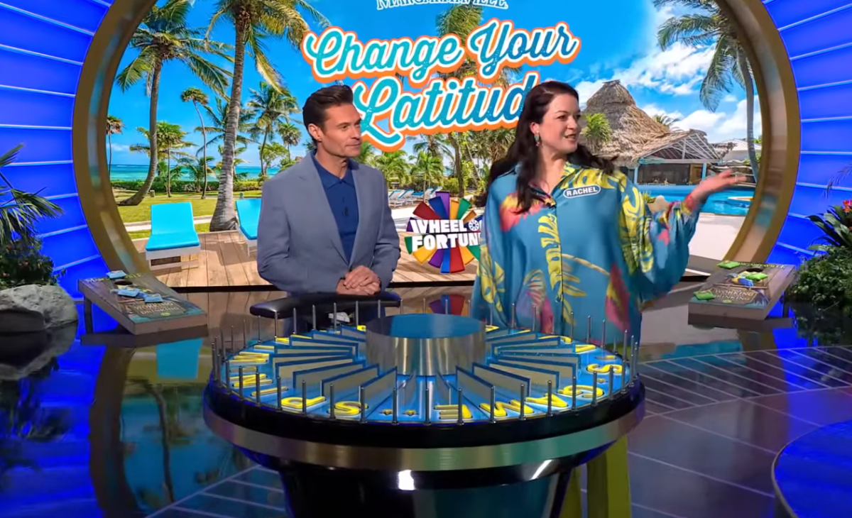 Show host Ryan Seacrest and contestant Rachel Granier in a 'Wheel of Fortune' episode, Photo Credit: Wheel of Fortune/Youtube