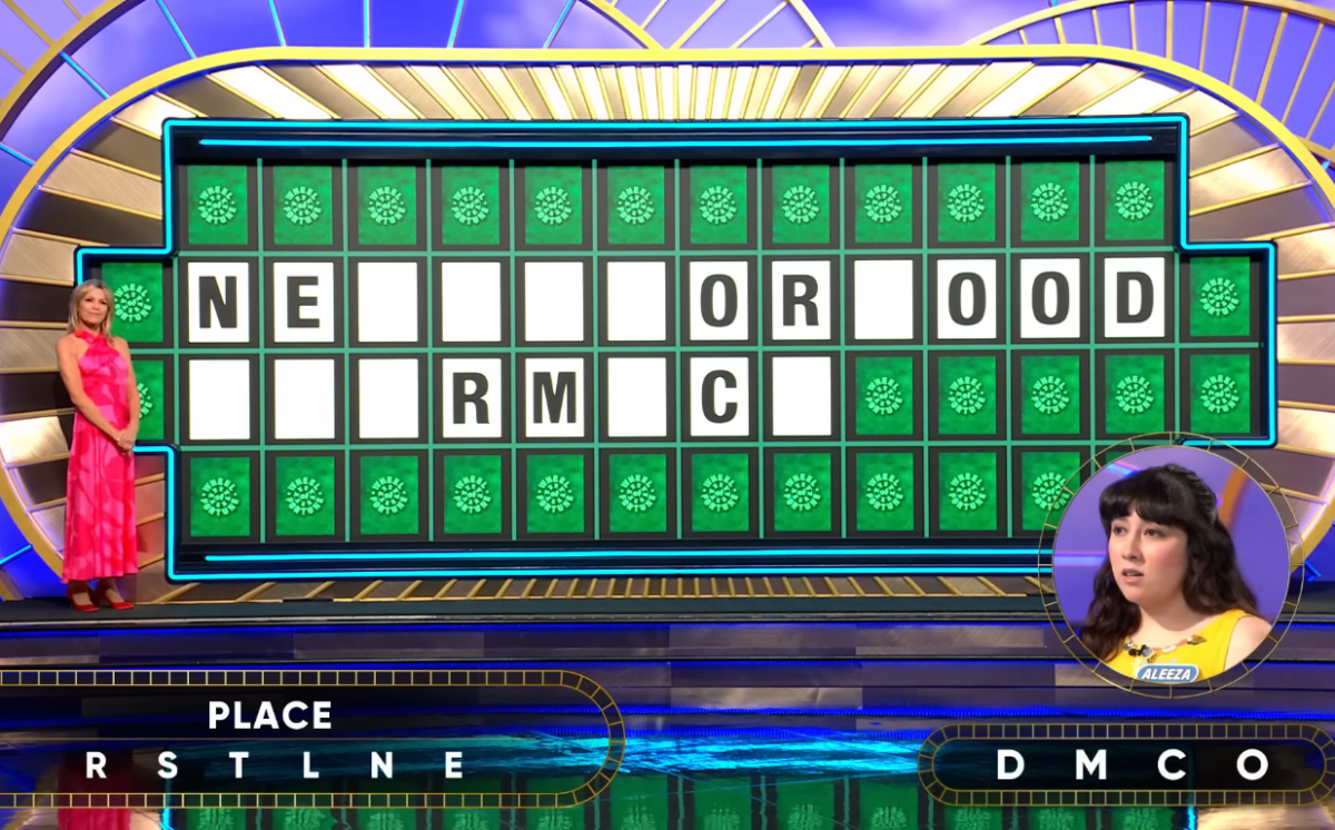 Show hostess Vanna White in a 'Wheel of Fortune' episode, Photo Credit: Wheel of Fortune/Youtube