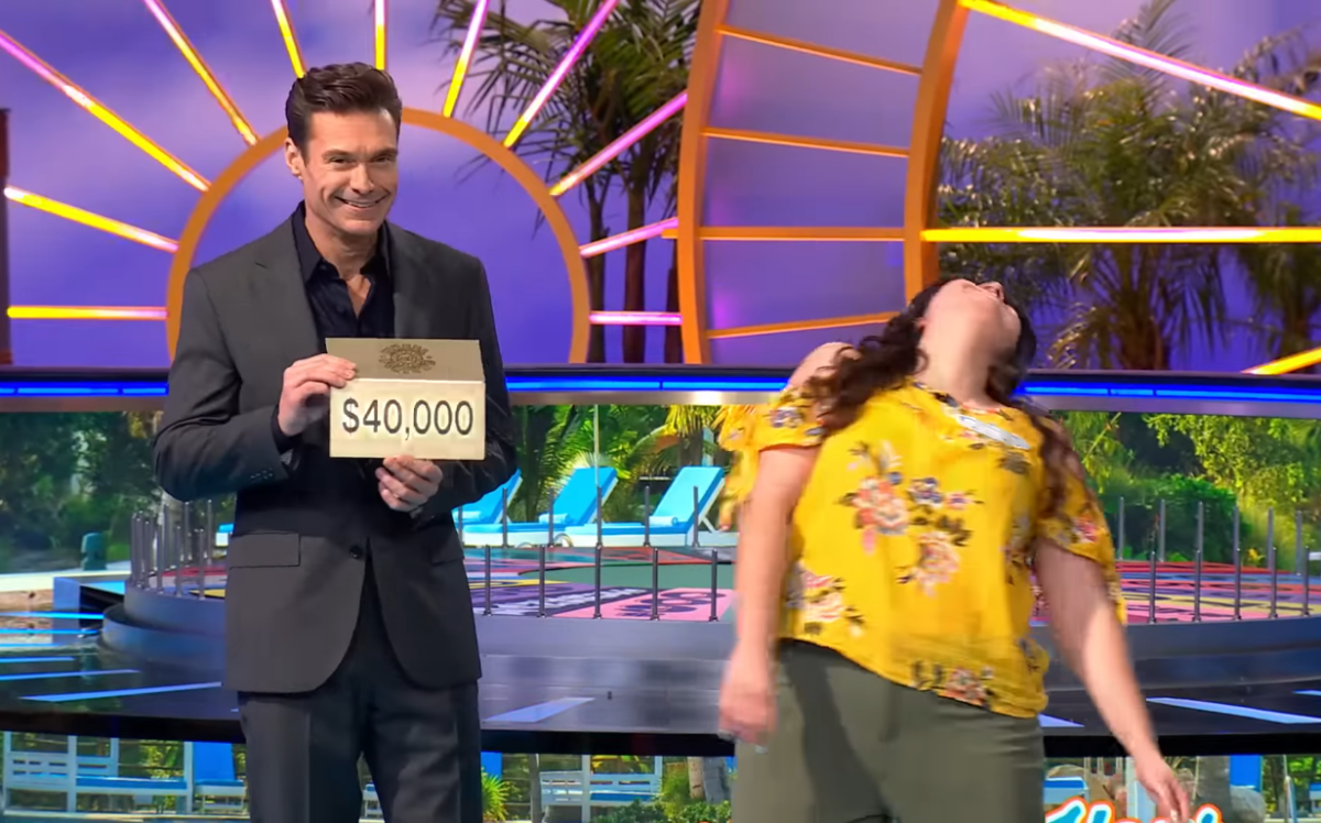 Show host Ryan Seacrest and contestant Aleeza Santillan in a 'Wheel of Fortune' episode, Photo Credit: Wheel of Fortune/Youtube