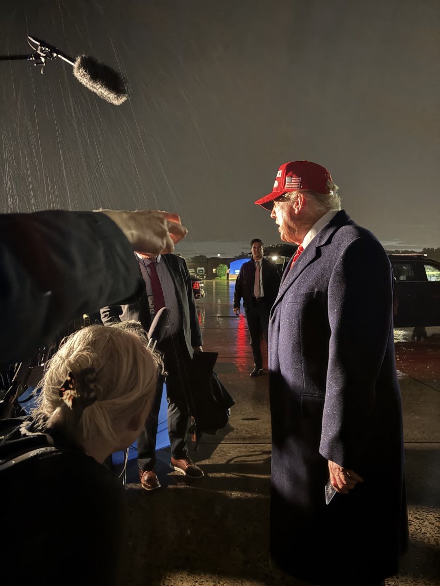 President Donald Trump talking to the press in the rain, Photo Credit: johnny maga/X