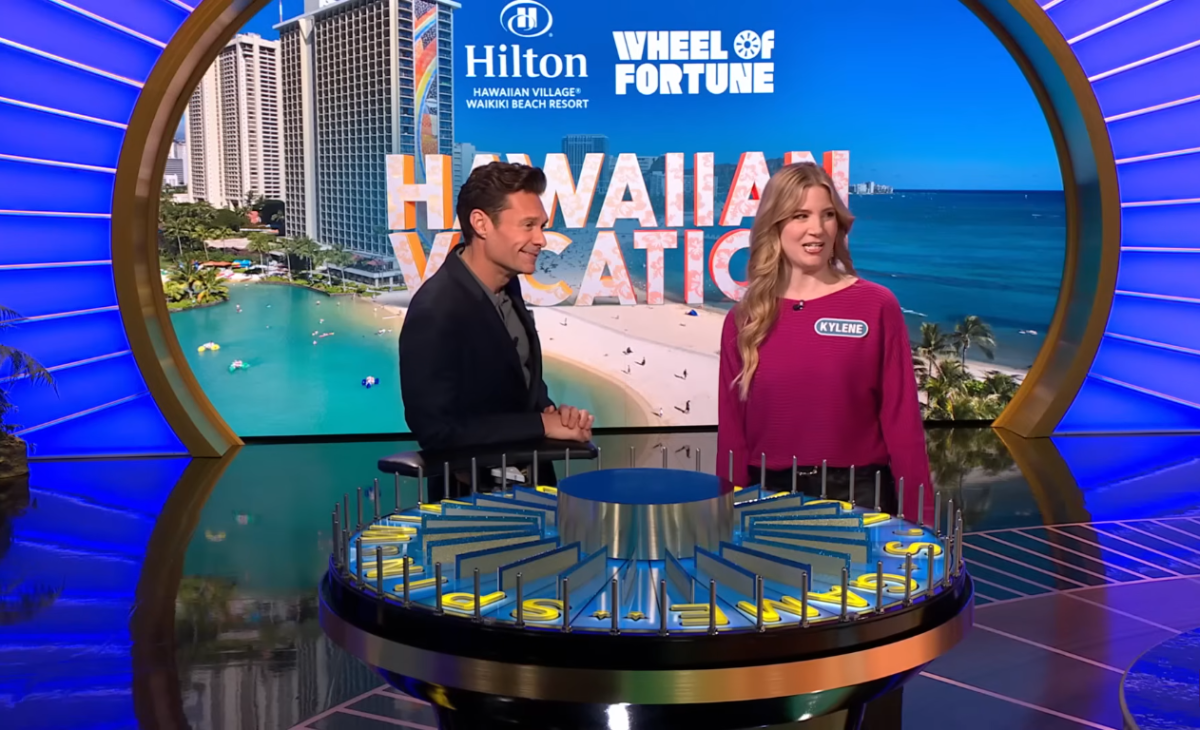 Show host Ryan Seacrest and contestant Kylene Foster in a 'Wheel of Fortune' episode, Photo Credit: Wheel of Fortune/Youtube