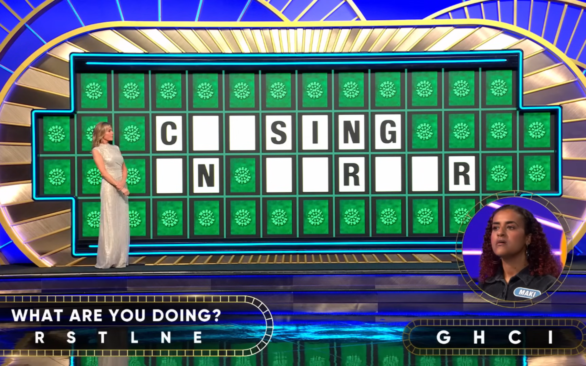 Show hostess Vanna White in a 'Wheel of Fortune' episode, Photo Credit: Wheel of Fortune/Youtube