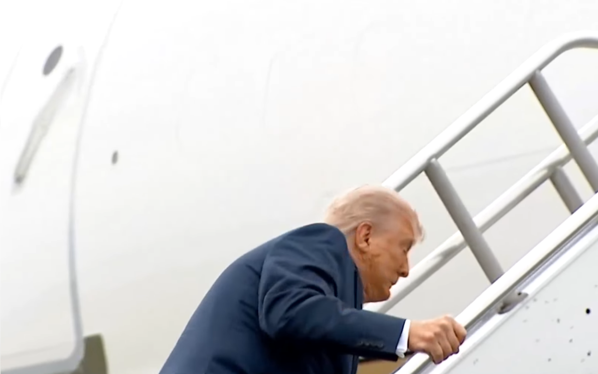President Donald Trump stumbles while going up stairs to Air Force One, Photo Credit: The Economic Times/Youtube
