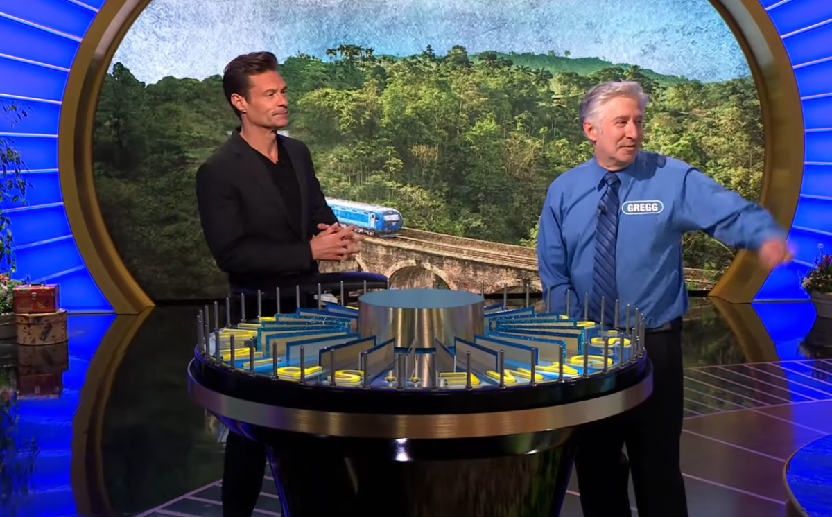Show host Ryan Seacrest and contestant Gregg Liebgold in a 'Wheel of Fortune' episode, Photo Credit: Wheel of Fortune/Youtube
