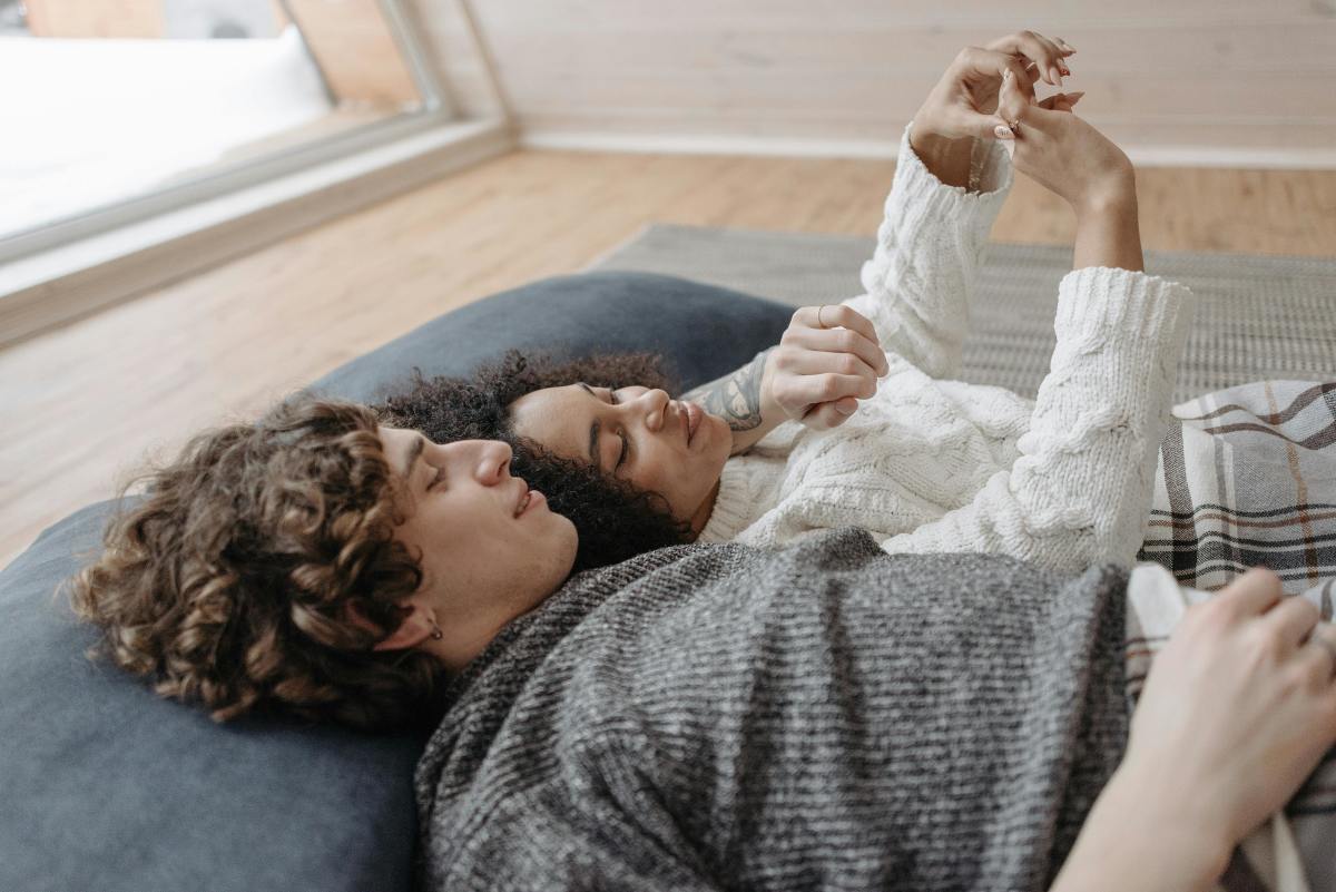 Woman lying beside a man, Photo Credit: Pexels