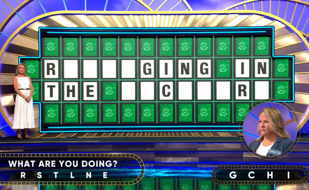 Show hostess Vanna White in a 'Wheel of Fortune' episode, Photo Credit: Wheel of Fortune/Youtube