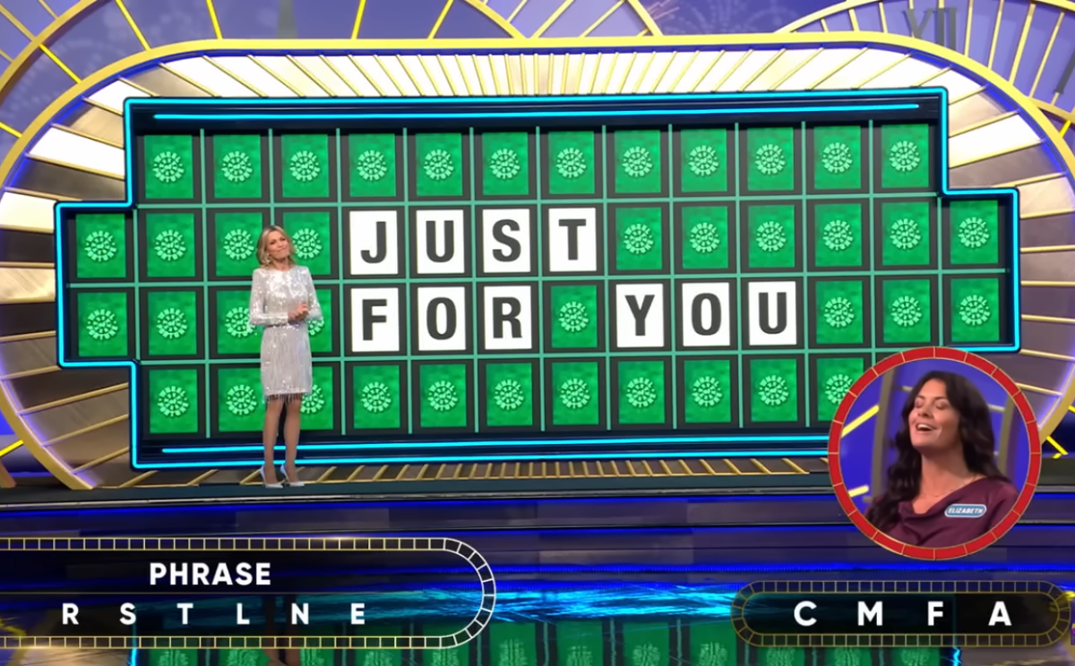 Show hostess Vanna White in a 'Wheel of Fortune' episode, Photo Credit: Wheel of Fortune/Youtube