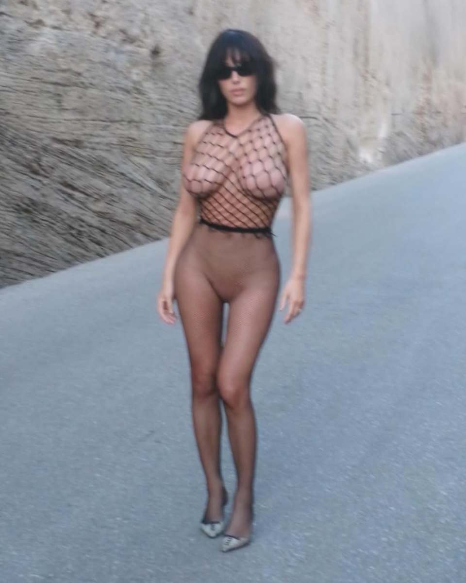 Bianca Censori wearing fishnet bodysuit, Photo Credit: biancacensori/Instagram