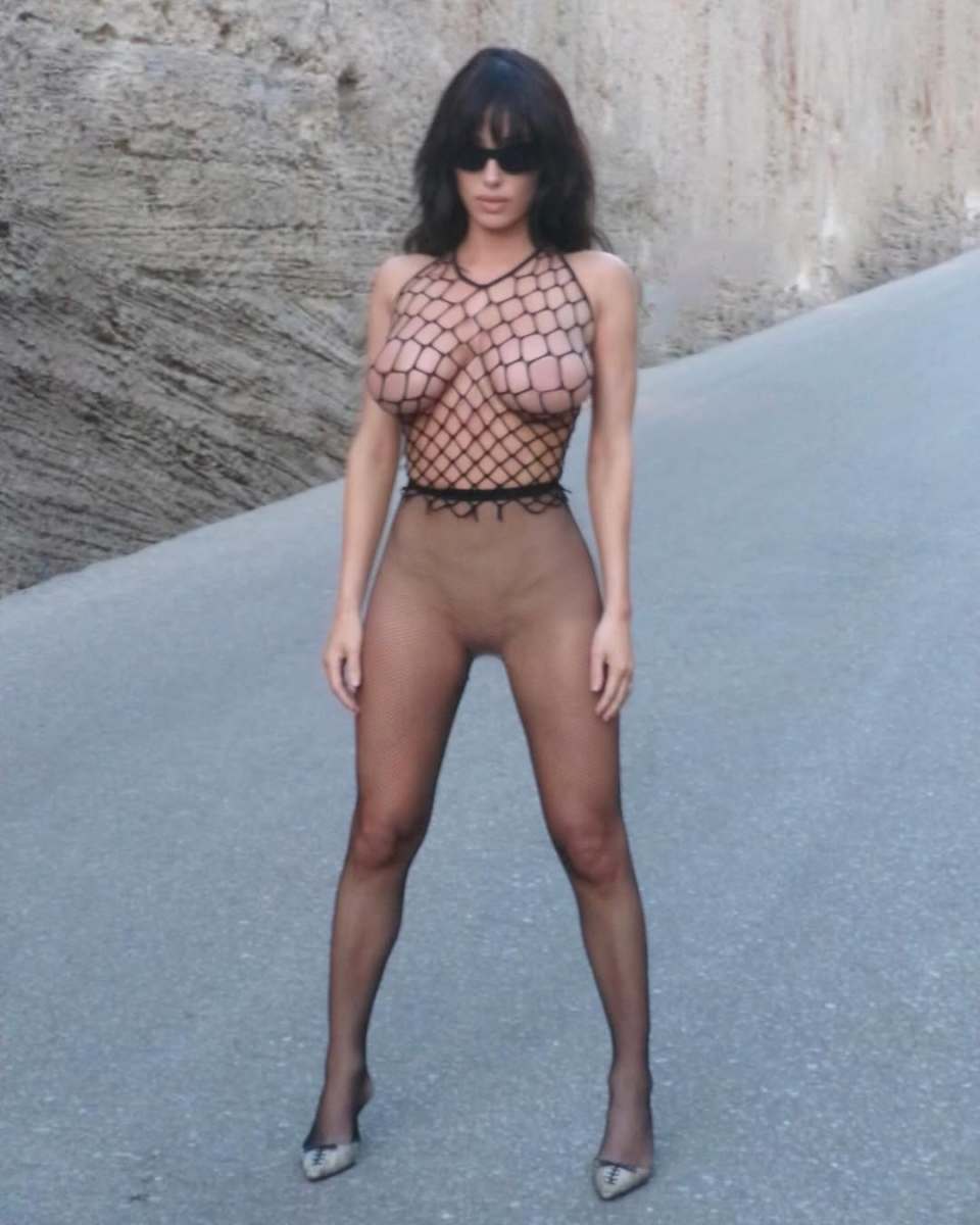 Bianca Censori wearing fishnet bodysuit, Photo Credit: biancacensori/Instagram