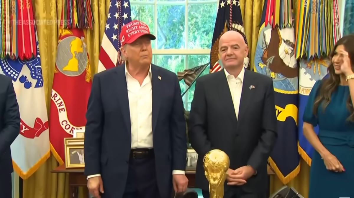 US President Donald Trump prior to the 2026 World Cup draw in the oval office, Photo Credit: Associated Press/Youtube