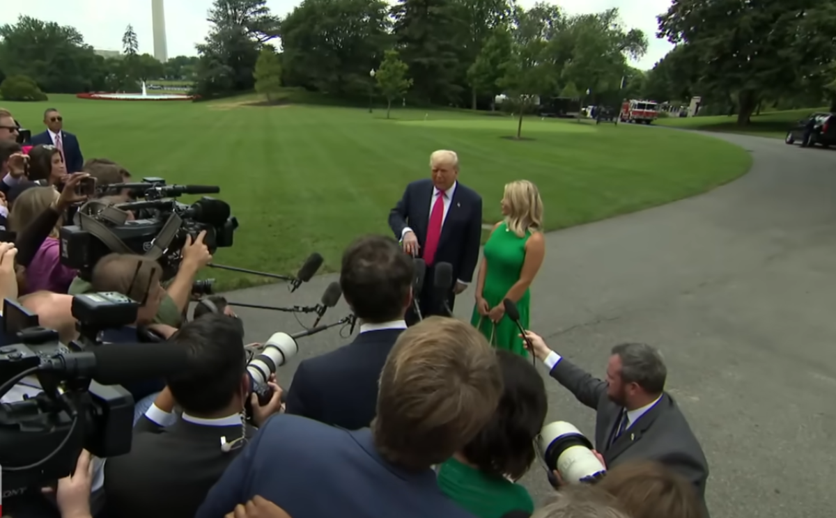 US President Donald Trump and White House Press Secretary Karoline Leavitt talking to reporters, Photo Credit: Inside Edition/Youtube