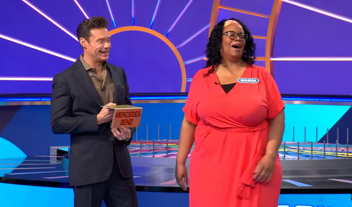 Show host Ryan Seacrest and contestant Wanda Ruff in a 'Wheel of Fortune' episode, Photo Credit: Wheel Of Fortune/Youtube