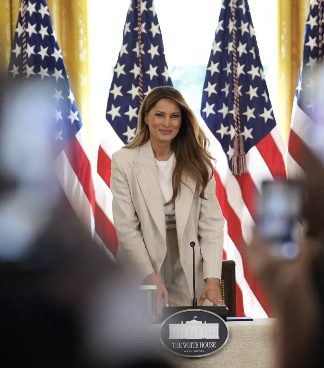 US First Lady Melania Trump wearing a power pantsuit during a meeting of the White House Task Force on Artificial Intelligence Education, Photo Credit: FLOTUS Report/X