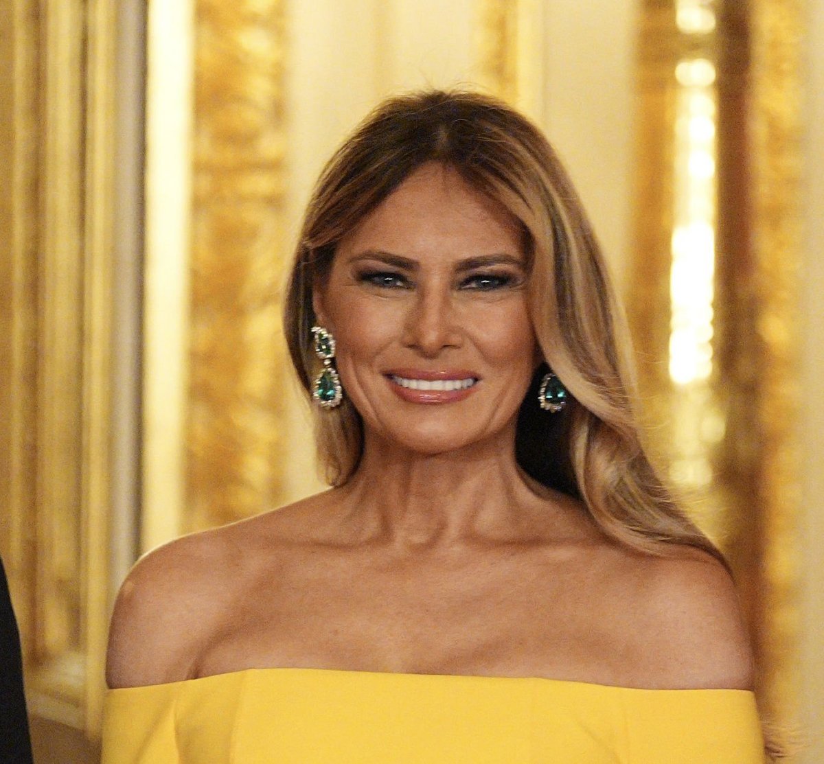 First Lady Melania Trump at Windsor Castle wearing a bright yellow dress, Photo Credit: FLOTUS Report/X