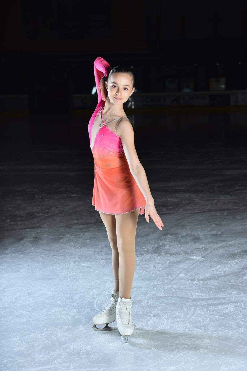 15 year old figure skater Matilda Ferrari posing on the ice, Photo Credit: ISU Figure Skating/X