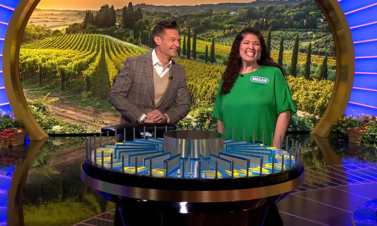 Show host Ryan Seacrest and contestant Megan Baldwin in a 'Wheel of Fortune' episode, Photo Credit: Wheel of Fortune/Youtube