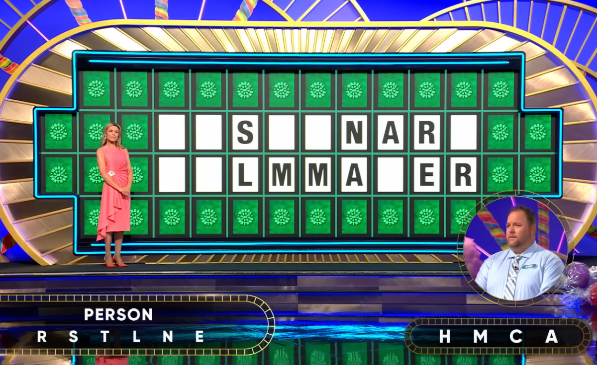 Show hostess Vanna White in a 'Wheel of Fortune' episode, Photo Credit: Wheel of Fortune/Youtube