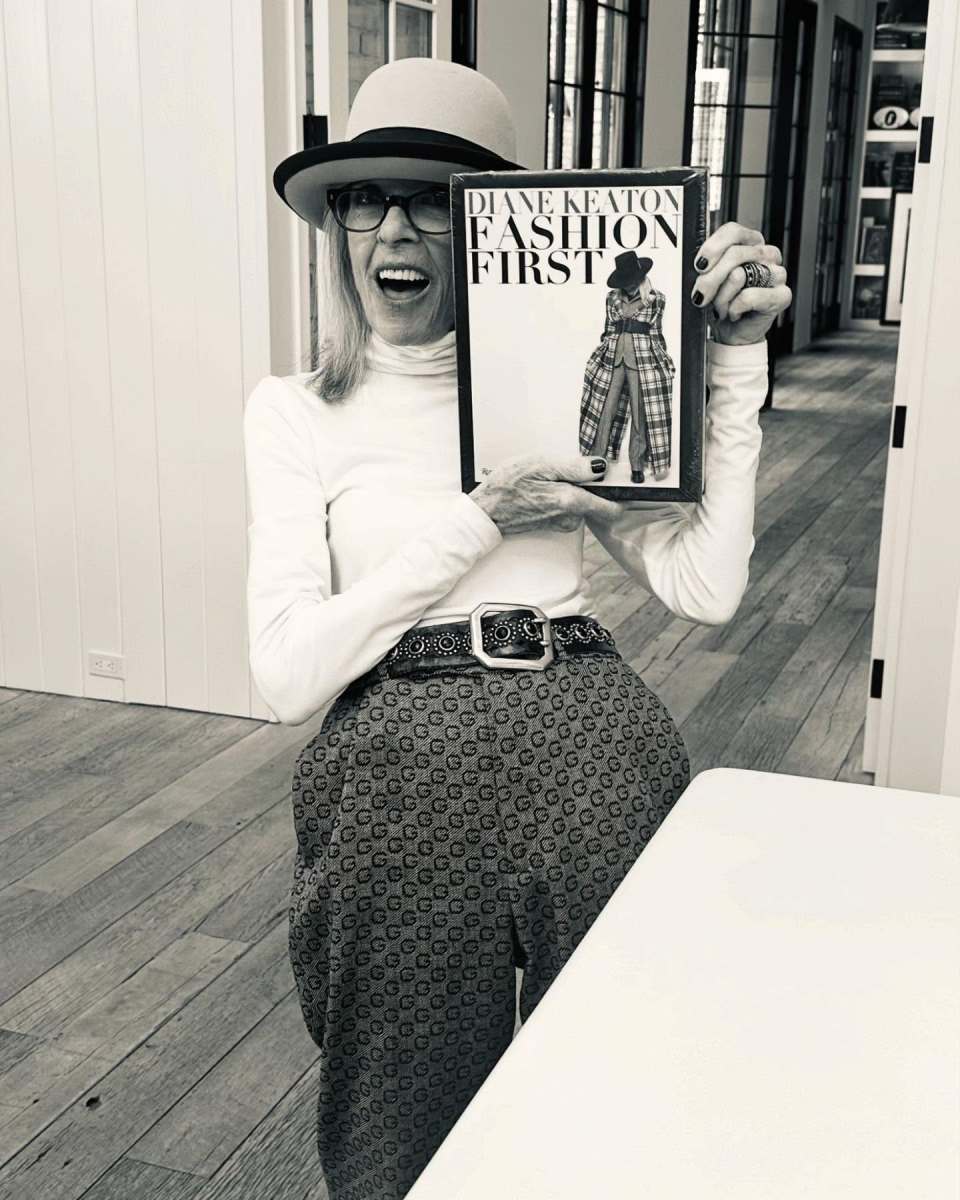 Diane Keaton holding her book titled "Fashion First", Photo Credit: diane_keaton/Instagram