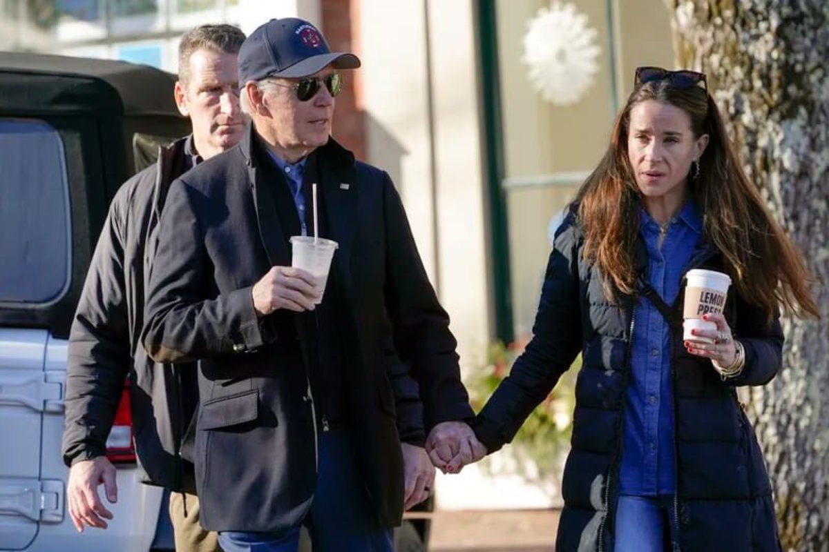 Joe Biden and Ashley Biden holding hands while walking, Photo Credit: ProudArmyBrat/X