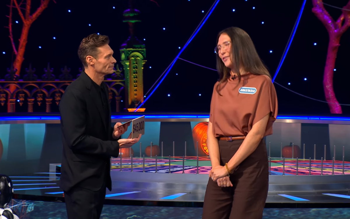 Show host Ryan Seacrest and contestant Anastasia Armitage in a 'Wheel of Fortune' episode, Photo Credit: Wheel of Fortune/Youtube