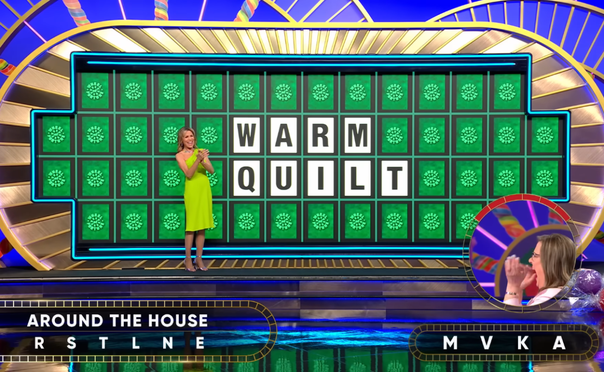 Show hostess Vanna White in a 'Wheel of Fortune' episode, Photo Credit: Wheel of Fortune/Youtube