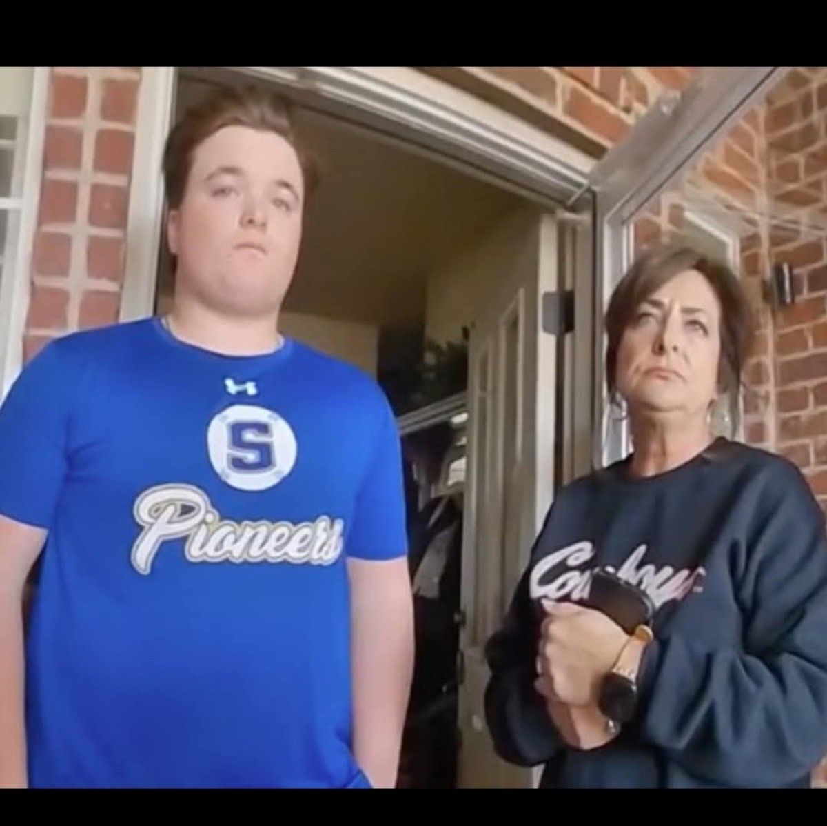Jesse Butler and his mother during his arrest at their front door, Photo Credit: Occupy Democrats/X