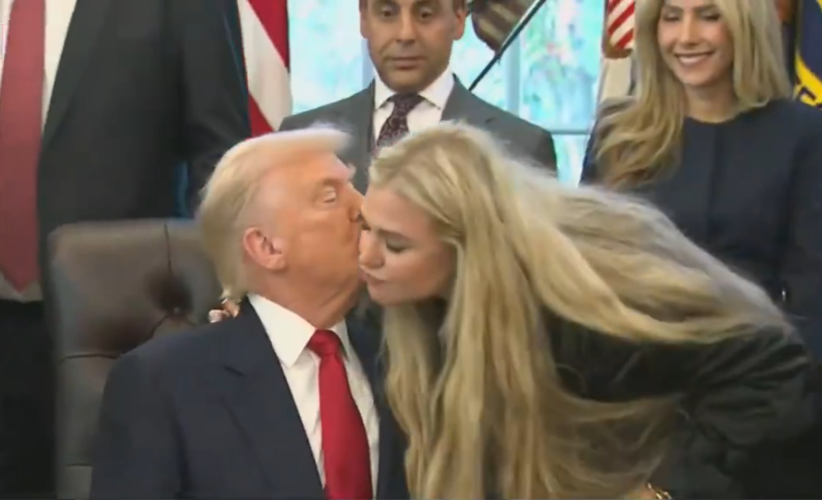 President Donald Trump giving Erika Kirk a kiss on the cheek in the Oval office, Photo Credit: Lucas Sanders/X