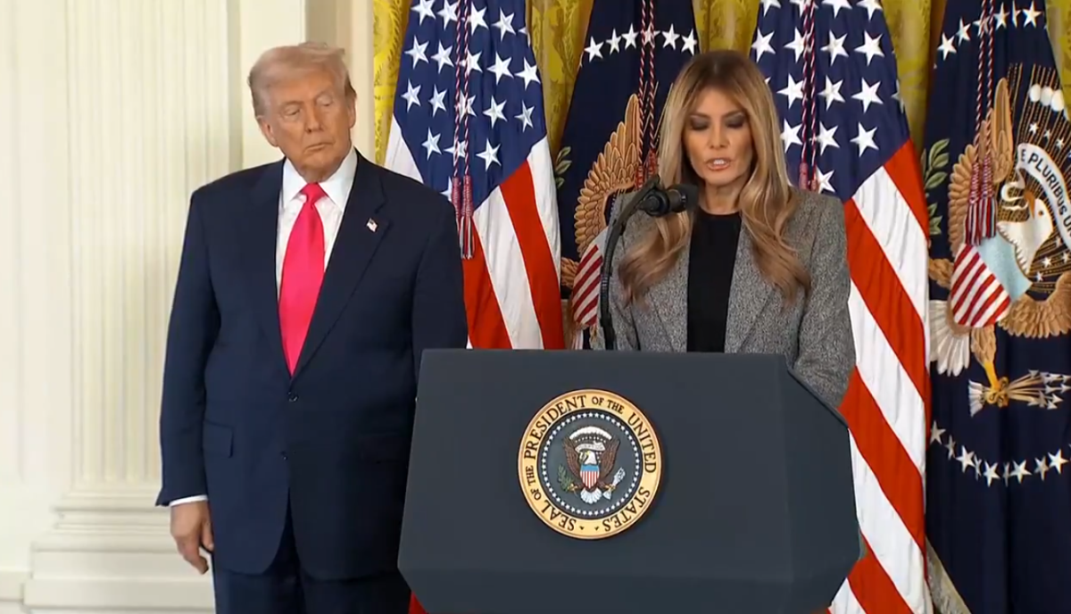 President Donald Trump standing beside his wife giving a speech, Photo Credit: Aaron Rupar/X
