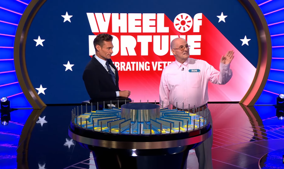 Show host Ryan Seacrest and contestant Ron Sheppard in a 'Wheel of Fortune' episode, Photo Credit: Wheel of Fortune/Youtube