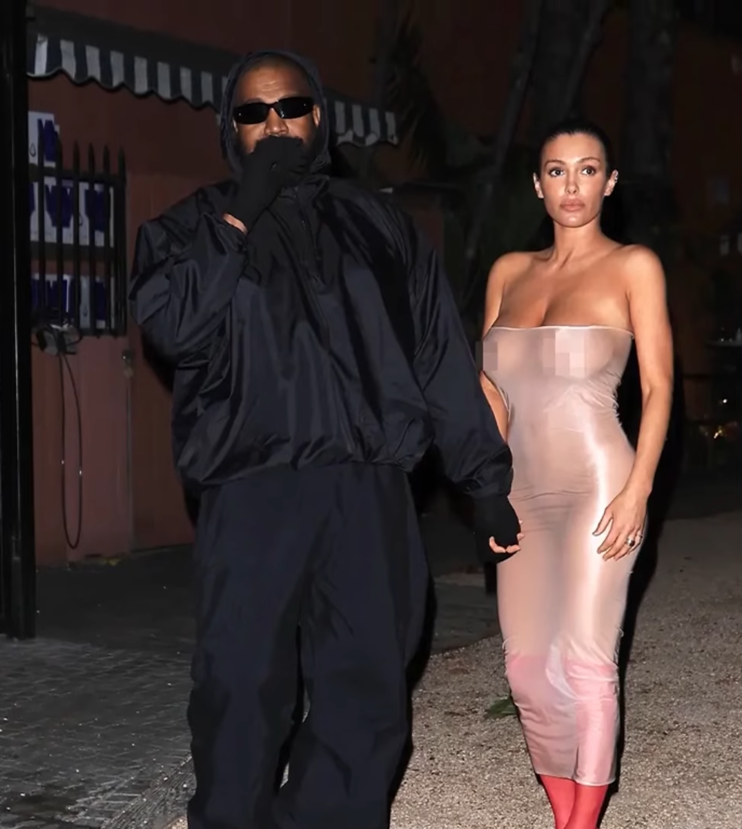 Bianca Censori posing with her husband Kanye West in a revealing dress, Photo Credit: Page Six/Youtube
