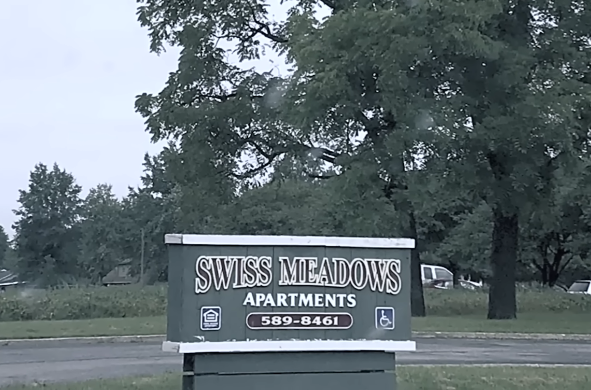 Exterior sign for the apartment complex where the 2-year-old's death occurred, Photo Credit: Law&Crime Network/Youtube