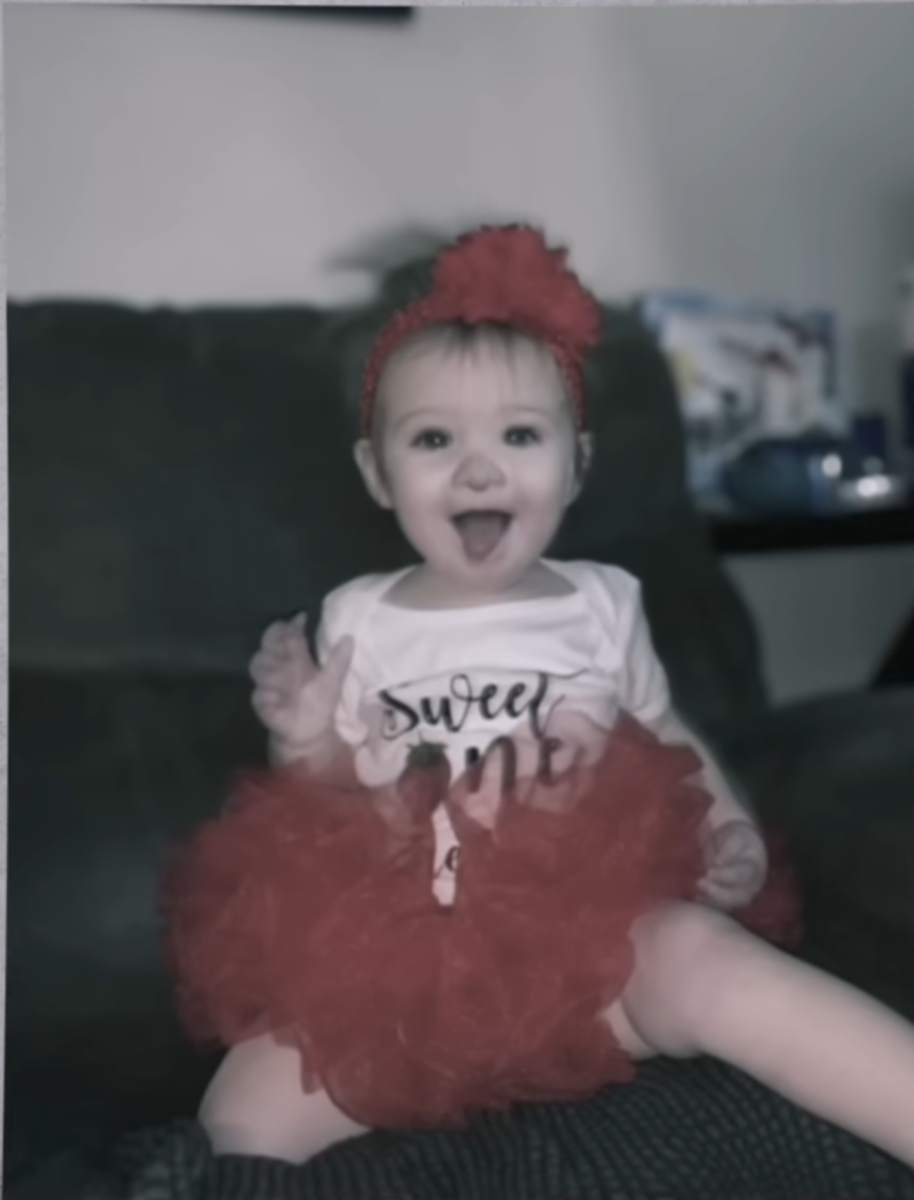Photo of the smiling 2-year-old, Photo Credit: Law&Crime Network/Youtube