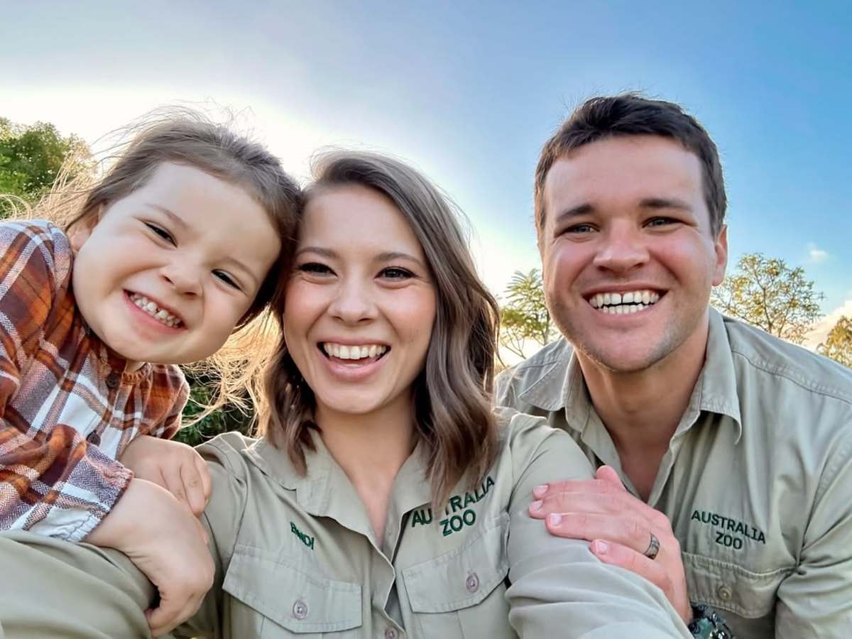 Bindi Irwin posing with her husband and daughter, Photo Credit: bindisueirwin/Instagram