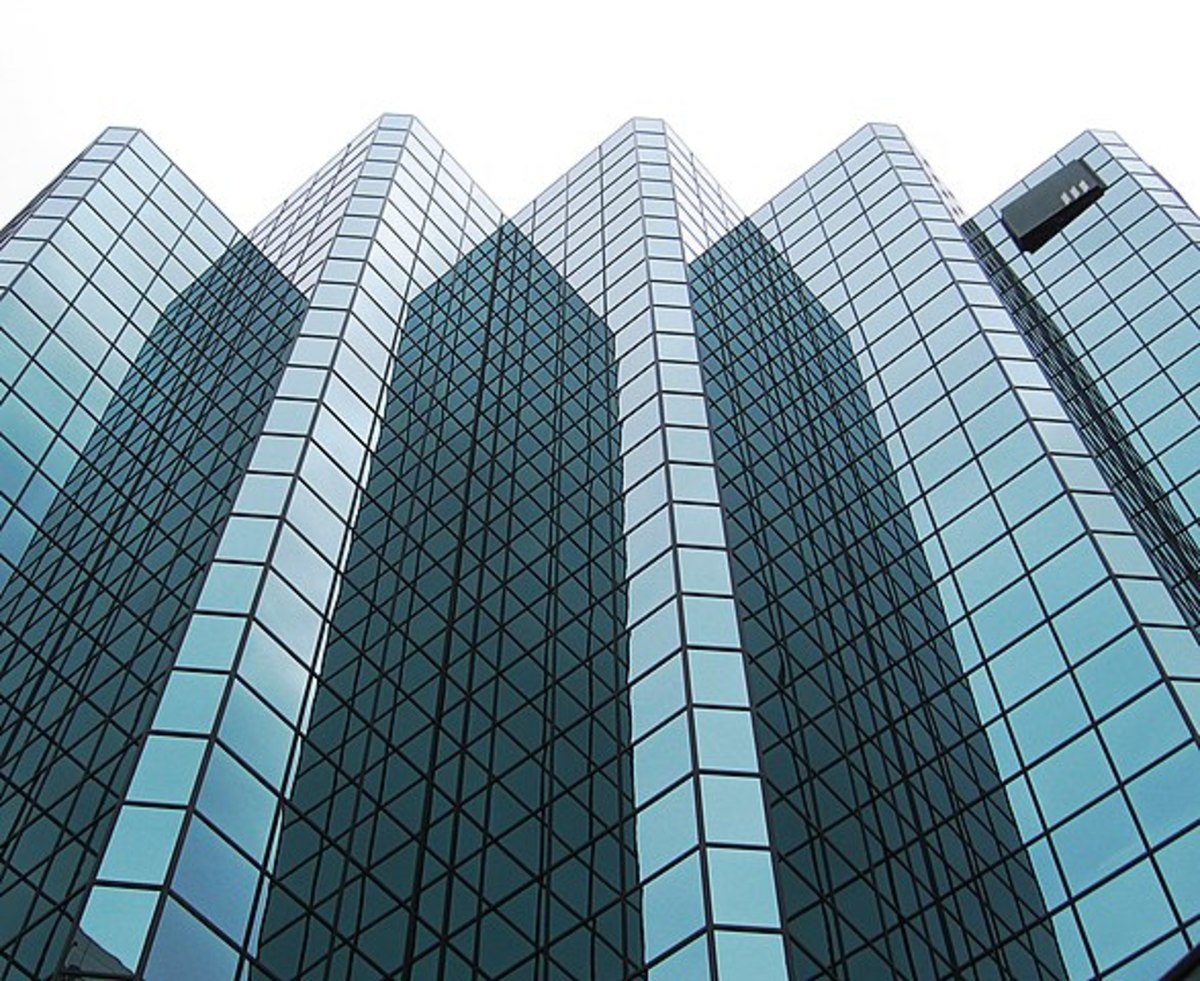 Optical illusion created by a photo of reflective buildings, Photo Credit: Wikimedia