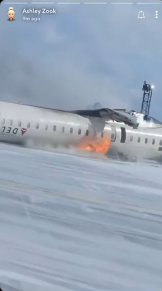 A Delta Plane in an upside down position burning on the ground, Photo Credit: PrivateJetClubs/X