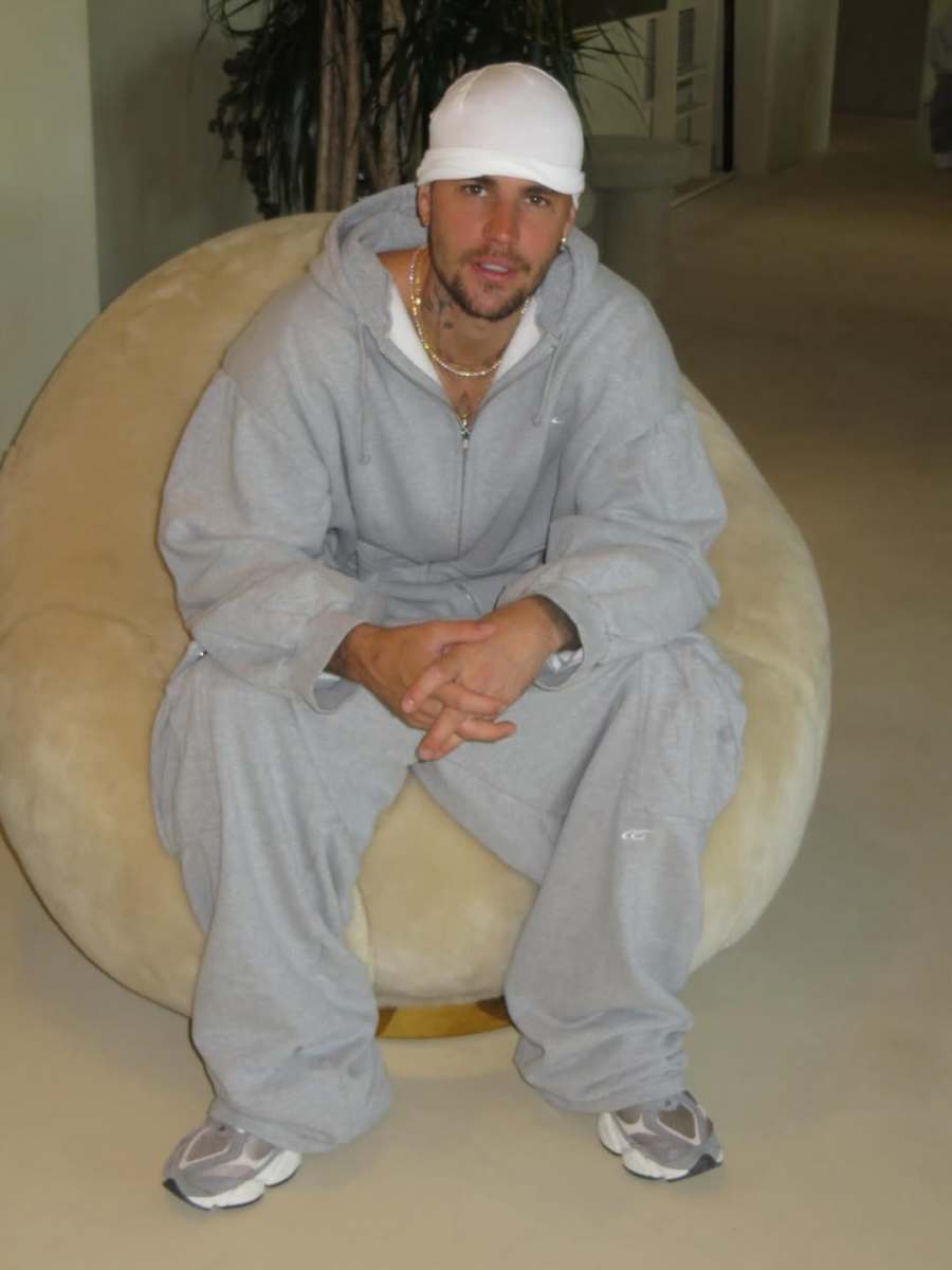 Justin Bieber sitting on a large beanbag chair, Photo Credit: lilbieber/X