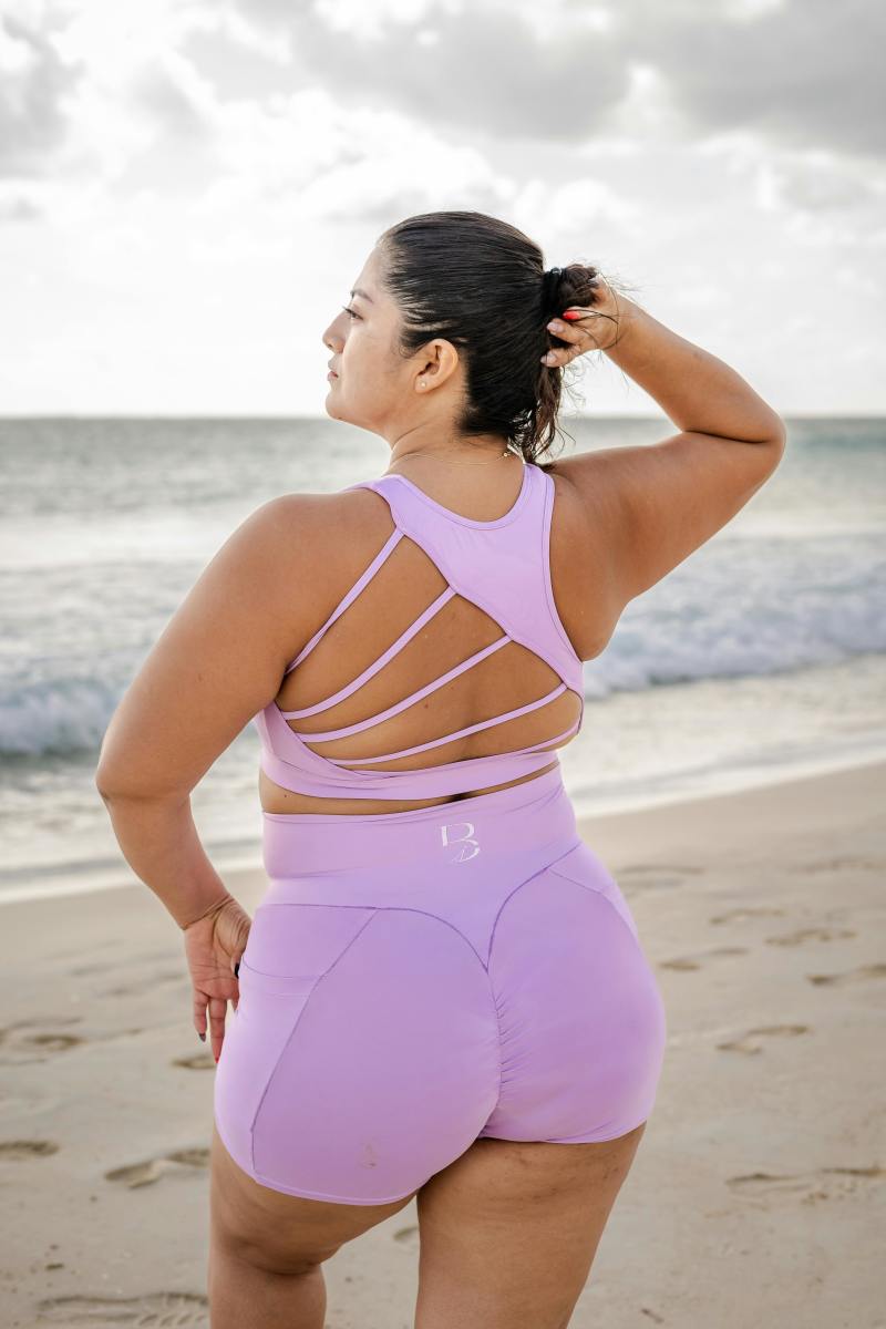 Confident Woman in Activewear on the Beach, Photo Credit: Pexels