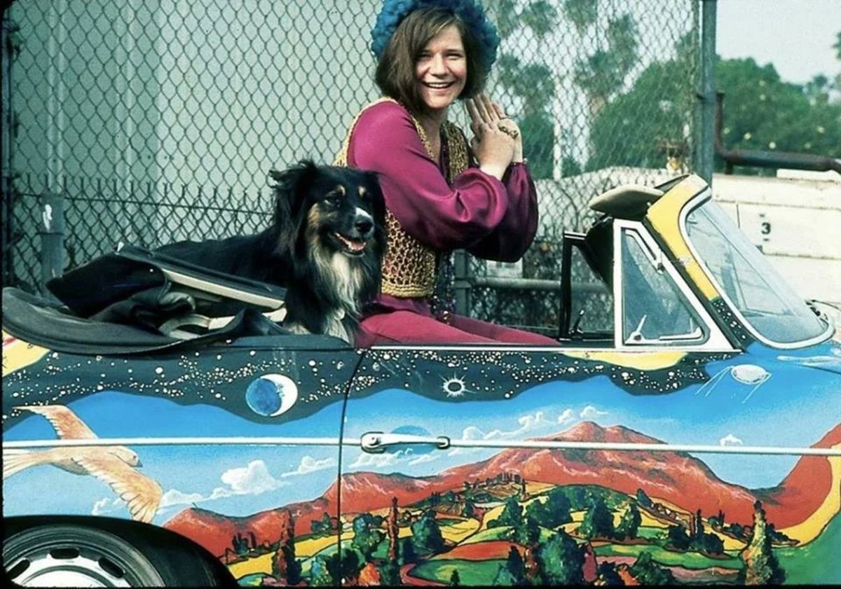 Janis Joplin with her dog George in her 1965 psychedelic Porsche, Photo Credit: Undiscovered History/X