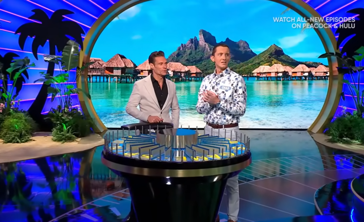 Show host Ryan Seacrest and contestant Chad Hedrick in a 'Wheel of Fortune' episode, Photo Credit: Wheel of Fortune/Youtube