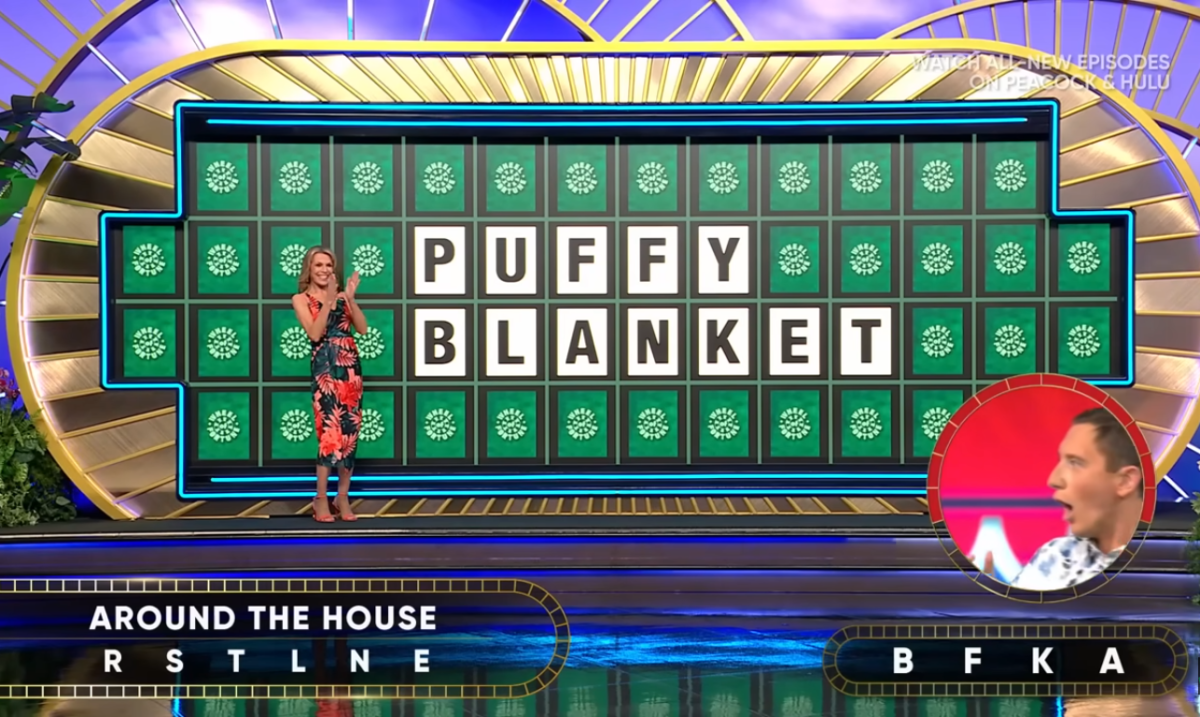 Show hostess Vanna White in a 'Wheel of Fortune' episode, Photo Credit: Wheel of Fortune/Youtube