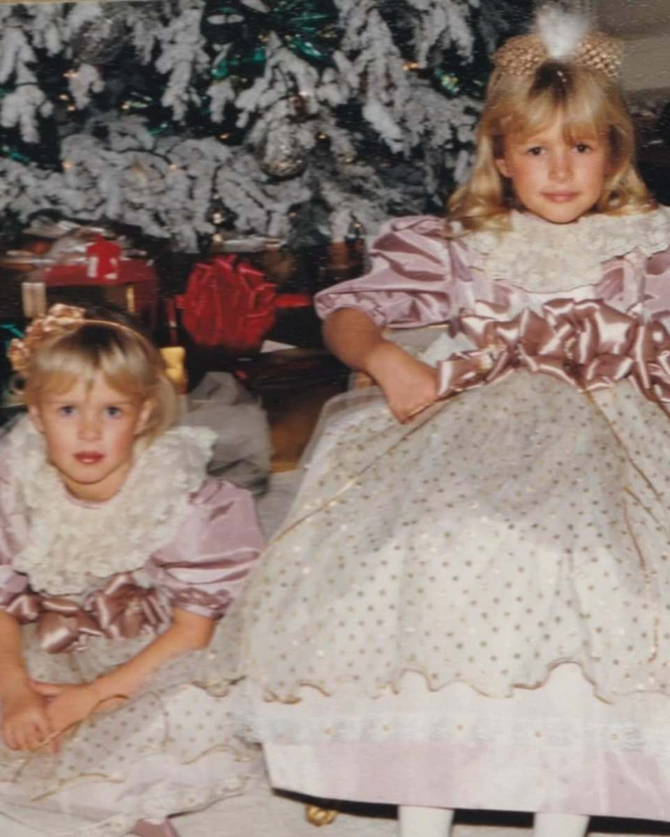 A young Paris Hilton with her younger sister Nicky Hilton wearing dresses, Photo Credit: hellocanadamag/Instagram