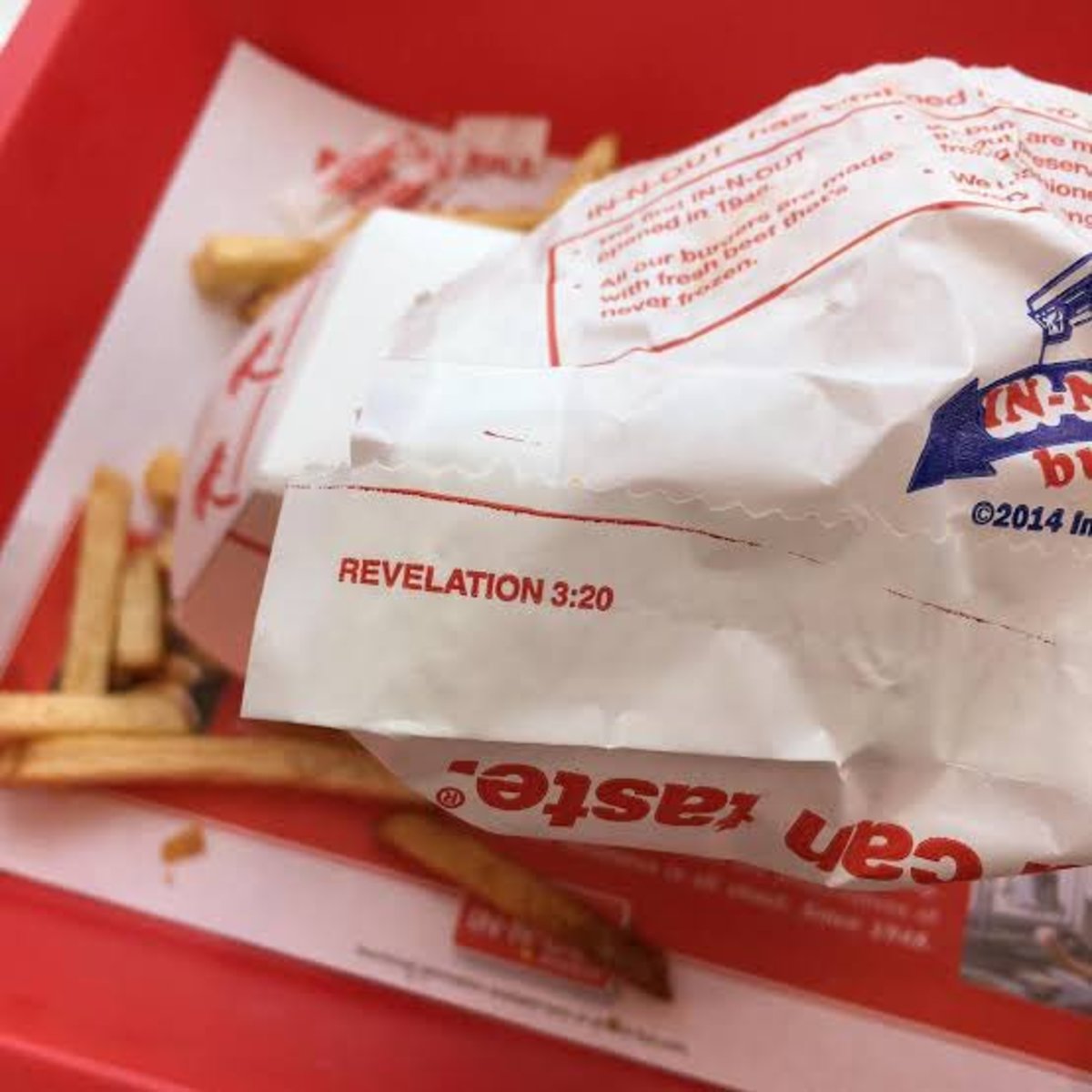 In-N-Out Burger wrapper with a specific bible verse printed on it, Photo Credit: The Christian Guy/X