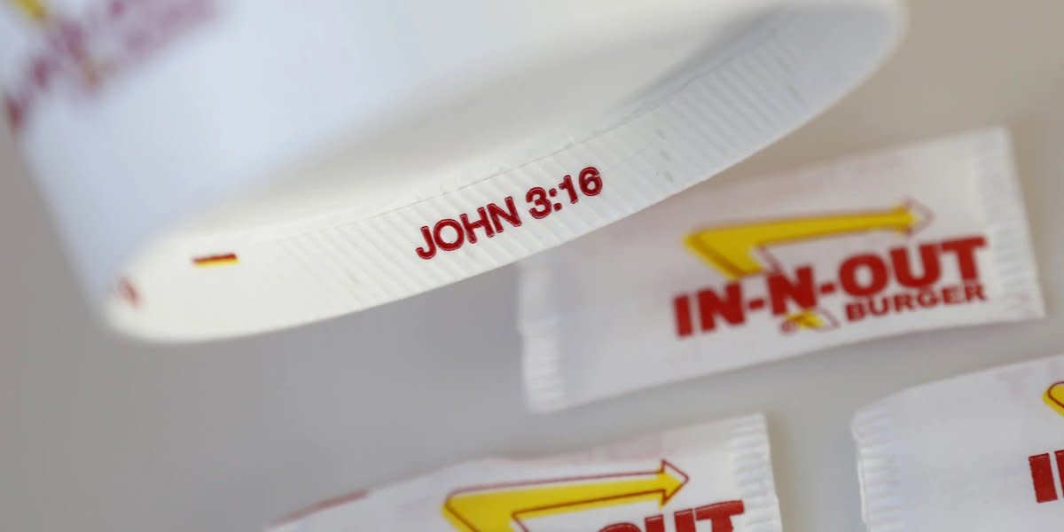 In-N-Out paper cup with a bible verse on its underside, Photo Credit: fan In-N-Out Burgers/X