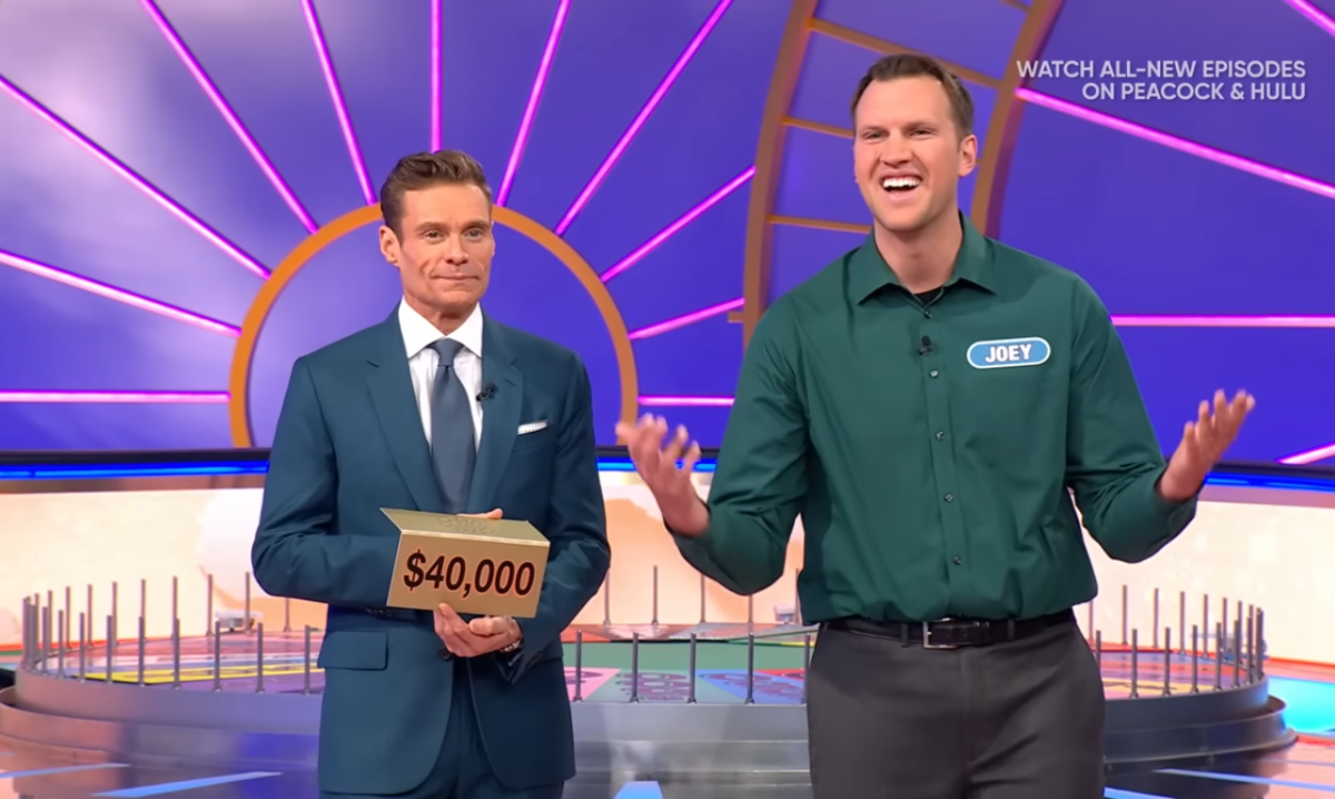Show host Ryan Seacrest and contestant Joey Moorman in a 'Wheel of Fortune' episode, Photo Credit: Wheel of Fortune/Youtube