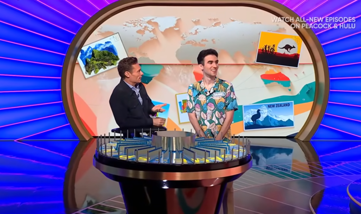 Show host Ryan Seacrest and contestant Daniel Goodman in a 'Wheel of Fortune' episode, Photo Credit: Wheel of Fortune/Youtube