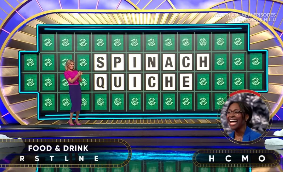 Show hostess Vanna White in a 'Wheel of Fortune' episode, Photo Credit: Wheel of Fortune/Youtube