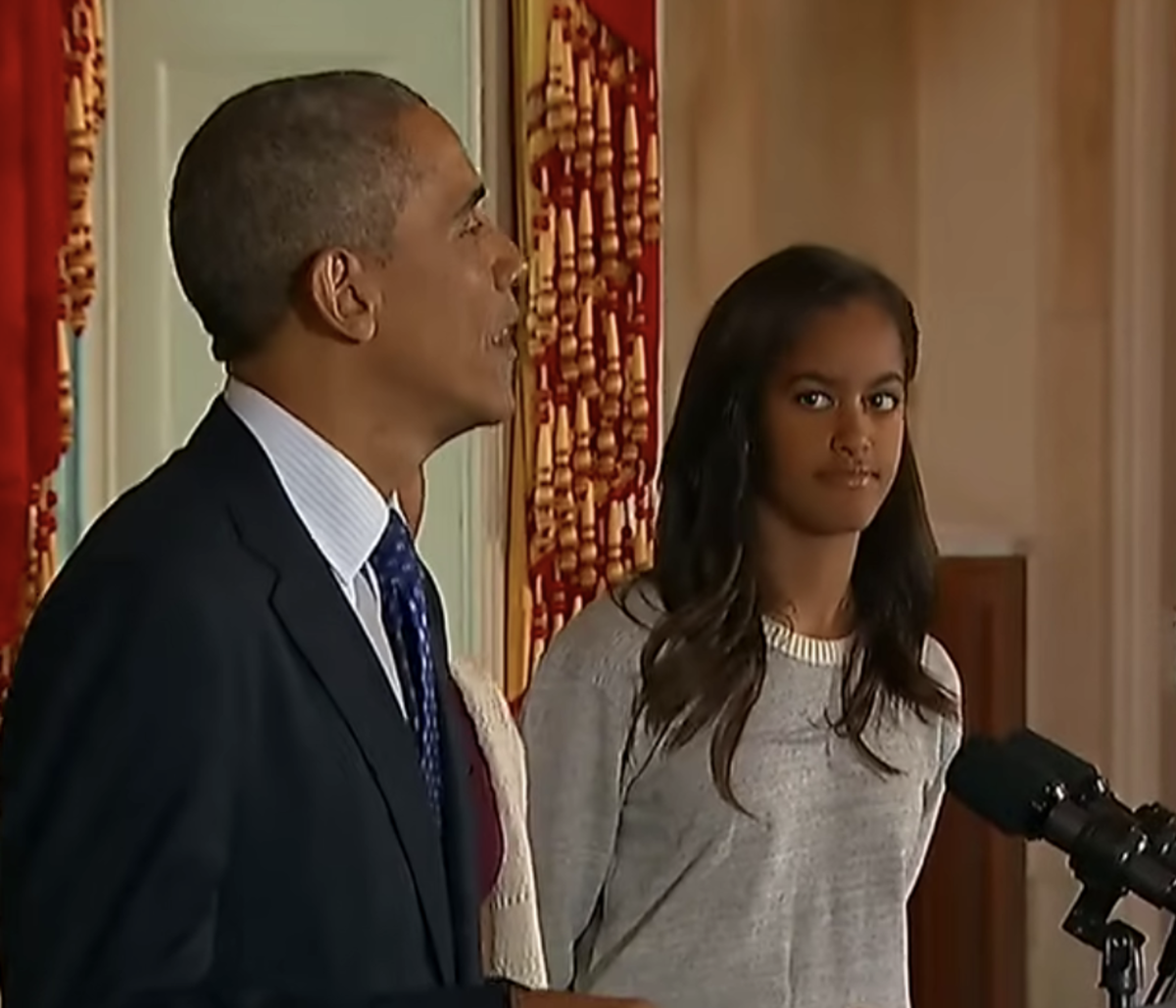 Malia Ann, formerly known as Malia Obama, next to her dad when he was in office, Photo Credit: Entertainment Tonight/Youtube